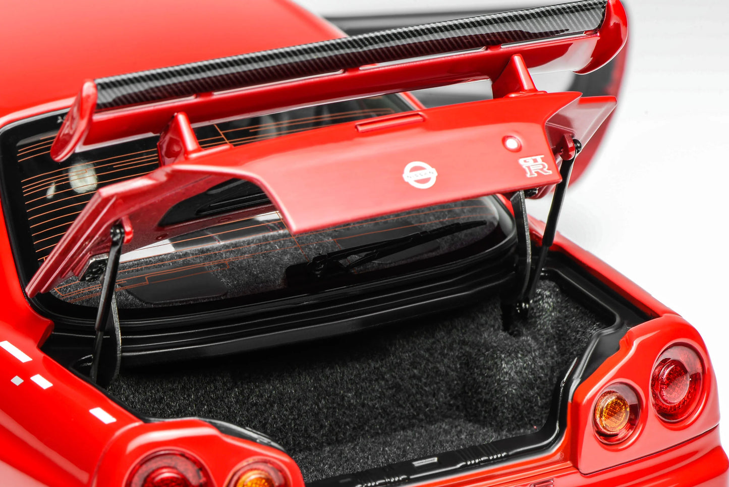 MOTORHELIX Nissan GT-R (R34) CRS Active Red 2002 | 1:18
