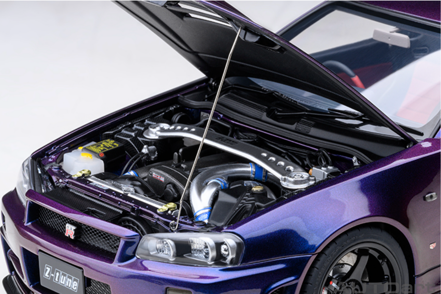 AUTOART Nissan Skyline GT-R (R34) Nismo Z Tune | Midnight Purple III 1:18
